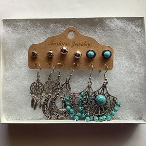 6 pairs of earrings - Silver tone and blue stone new in box